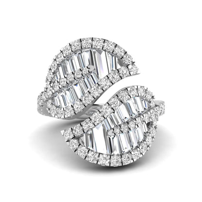 Baguette and round cut lab grown diamond bypass leaf ring with prong setting in white gold tone.