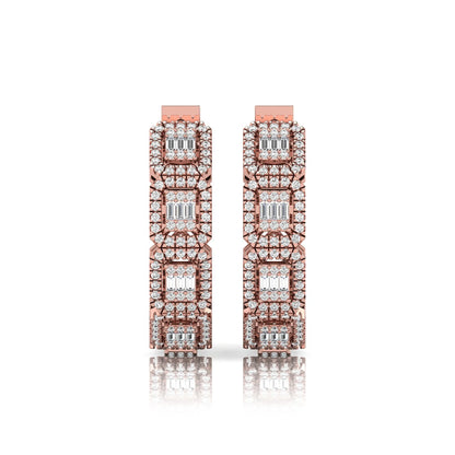 Lab grown diamond huggie hoop earrings featuring baguette cut diamond centers surrounded by round diamond halos in a geometric multi-station design in rose gold