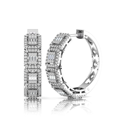 Lab grown diamond huggie hoop earrings featuring baguette cut diamond centers surrounded by round diamond halos in a geometric multi-station design in white gold