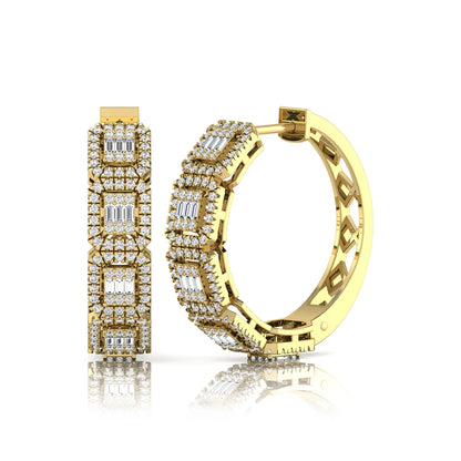 Lab grown diamond huggie hoop earrings featuring baguette cut diamond centers surrounded by round diamond halos in a geometric multi-station design in yellow gold