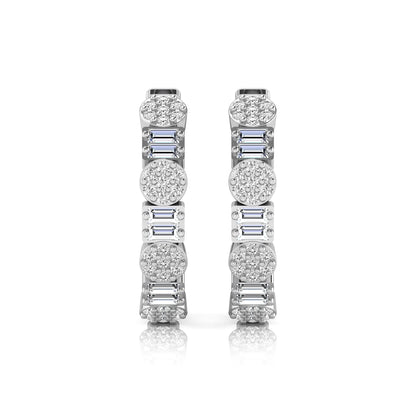 Lab grown diamond huggie hoop earrings featuring alternating baguette cut and round brilliant diamonds with pavé diamond detailing on a white gold hinged hoop.