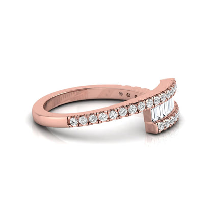 Open wrap ring featuring baguette and round lab grown diamonds in a rose gold metal finish.