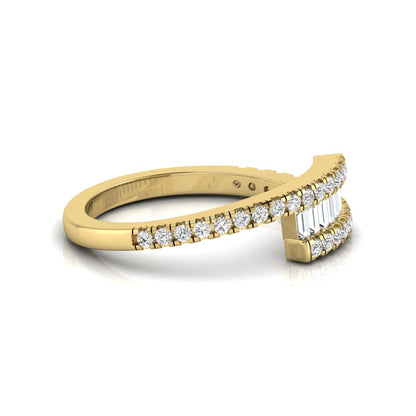 Open wrap ring featuring baguette and round lab grown diamonds in a yellow gold metal finish.