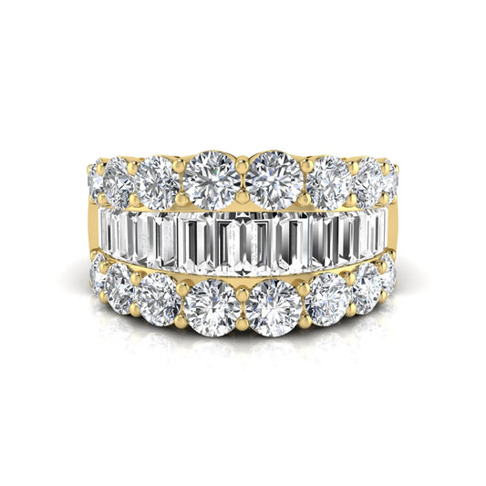 Wide band lab grown diamond ring featuring baguette cut diamonds framed by round brilliant diamonds in yellow gold.