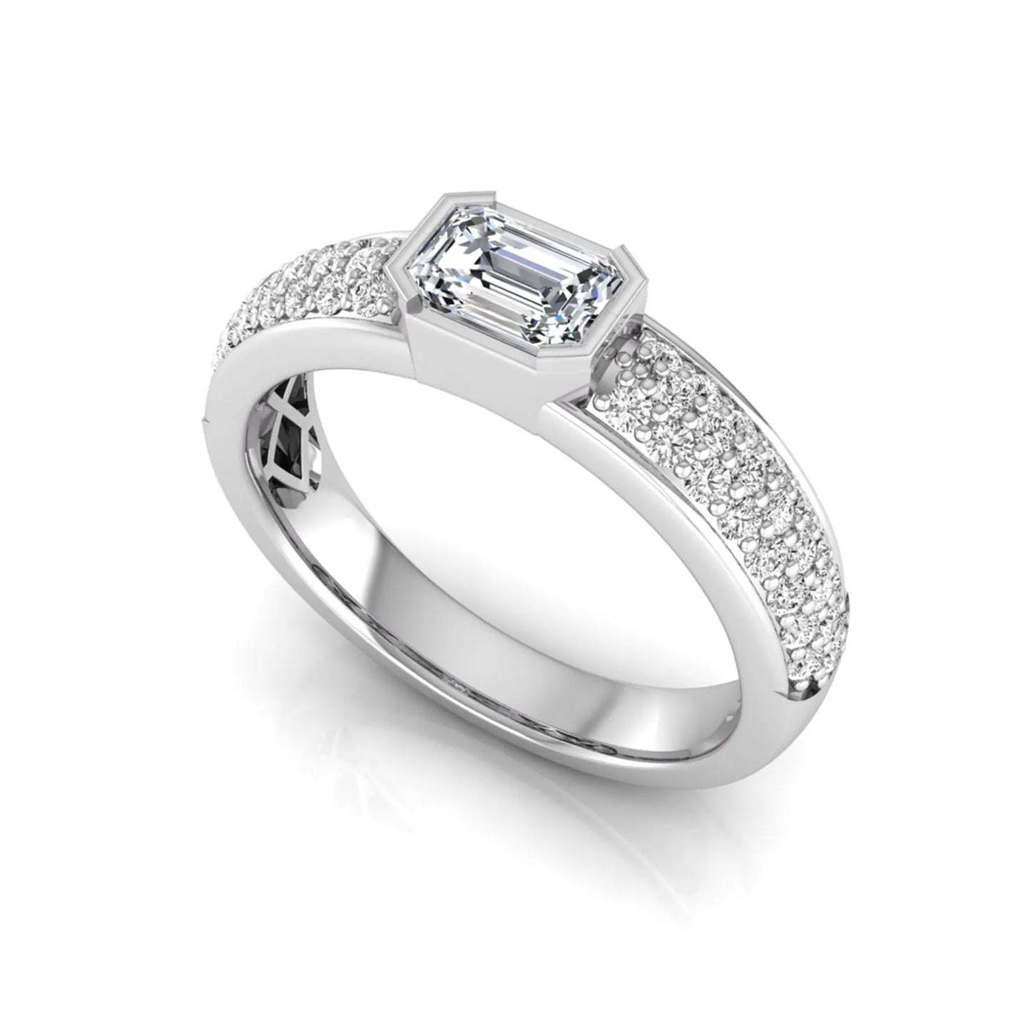 Bezel set emerald cut lab grown diamond engagement ring featuring a 0.52 carat emerald center diamond with pavé round diamond band in white gold.