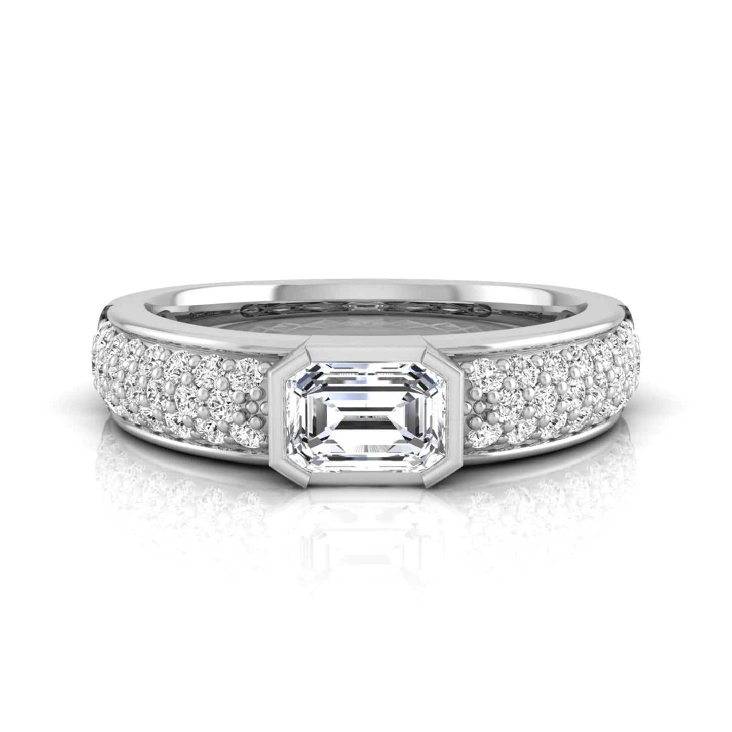 Bezel set emerald cut lab grown diamond engagement ring featuring a 0.52 carat emerald center diamond with pavé round diamond band in white gold.