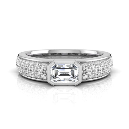 Bezel set emerald cut lab grown diamond engagement ring featuring a 0.52 carat emerald center diamond with pavé round diamond band in white gold.