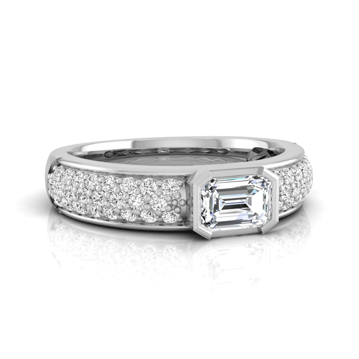 Bezel set emerald cut lab grown diamond engagement ring featuring a 0.52 carat emerald center diamond with pavé round diamond band in white gold.
