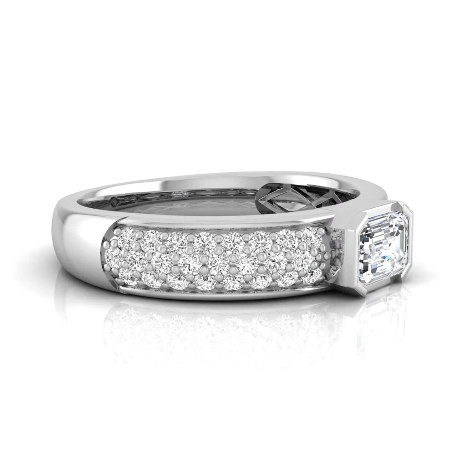 Bezel set emerald cut lab grown diamond engagement ring featuring a 0.52 carat emerald center diamond with pavé round diamond band in white gold.