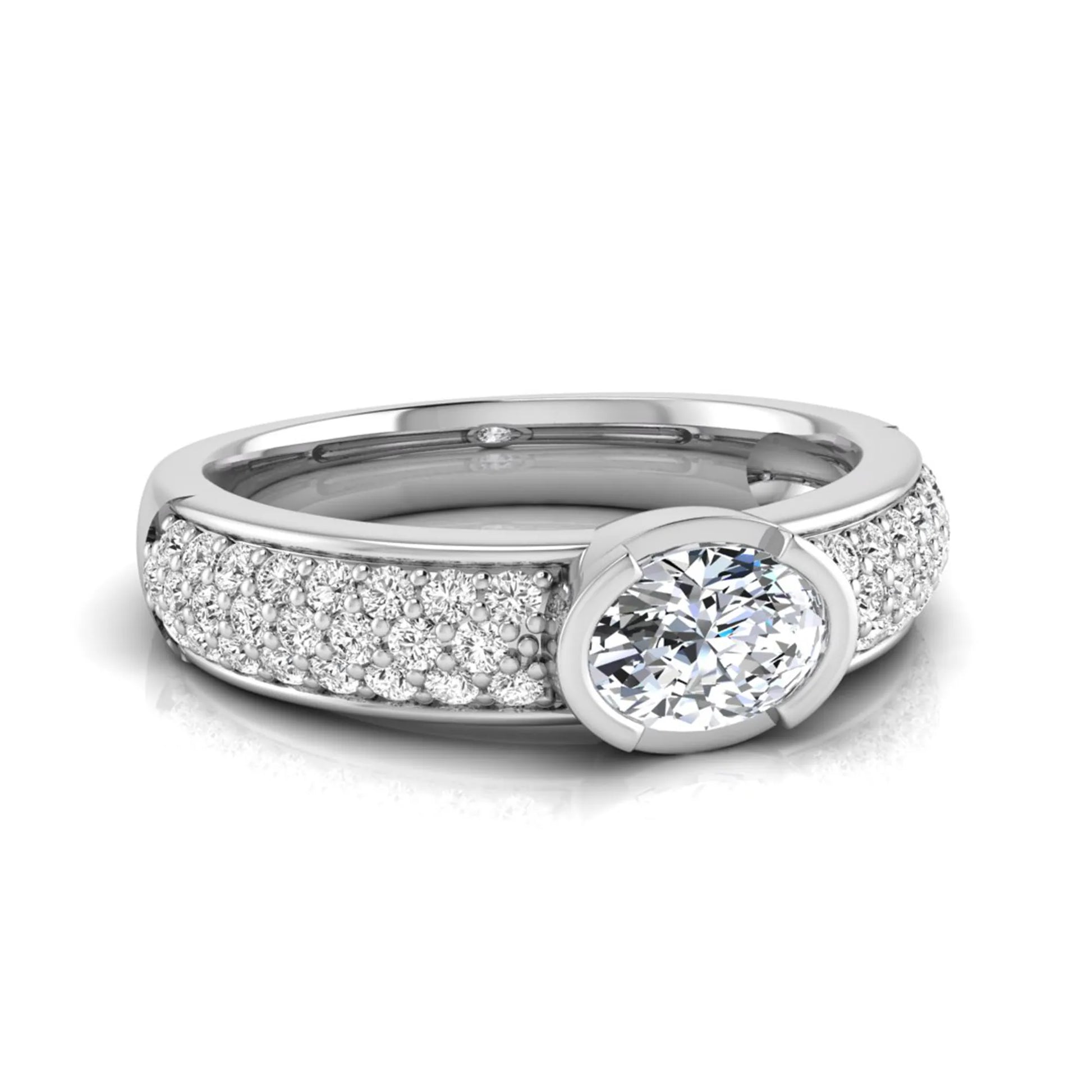 Bezel set oval lab grown diamond engagement ring featuring a 0.52 carat oval center diamond with pavé round diamond band in white gold.