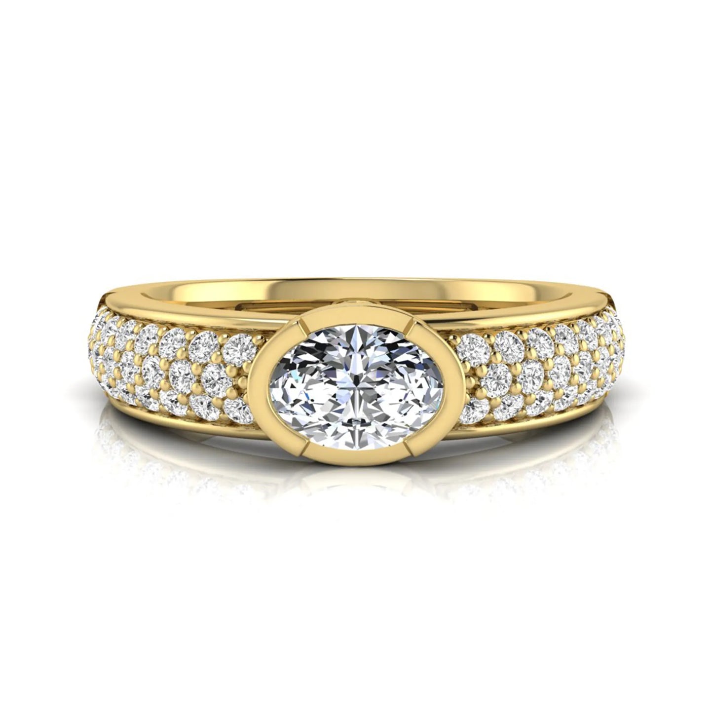 Bezel set oval lab grown diamond engagement ring featuring a 0.52 carat oval center diamond with pavé round diamond band in yellow gold.