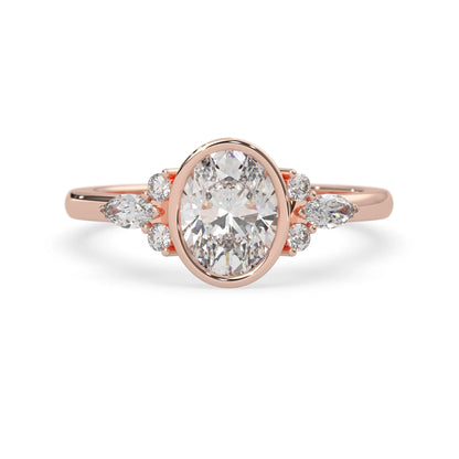 bezel set oval lab grown diamond seven stone floral engagement ring with marquise and round side diamonds in rose gold