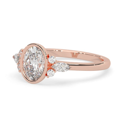 bezel set oval lab grown diamond seven stone floral engagement ring with marquise and round side diamonds in rose gold