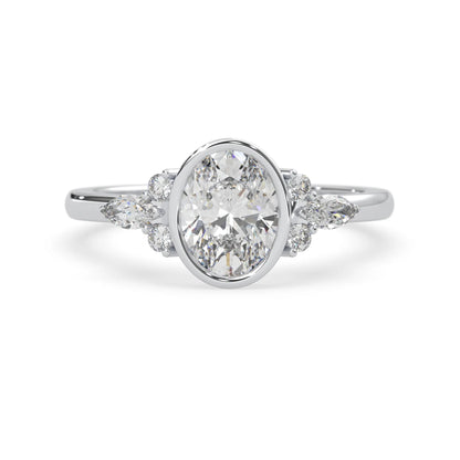 bezel set oval lab grown diamond seven stone floral engagement ring with marquise and round side diamonds in white gold