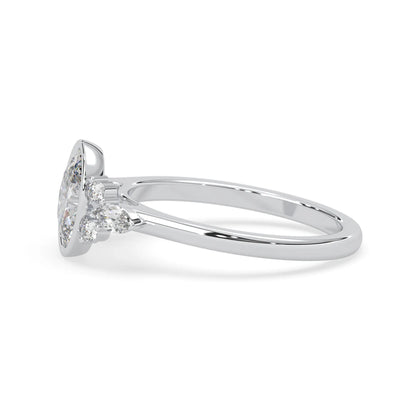 bezel set oval lab grown diamond seven stone floral engagement ring with marquise and round side diamonds in white gold