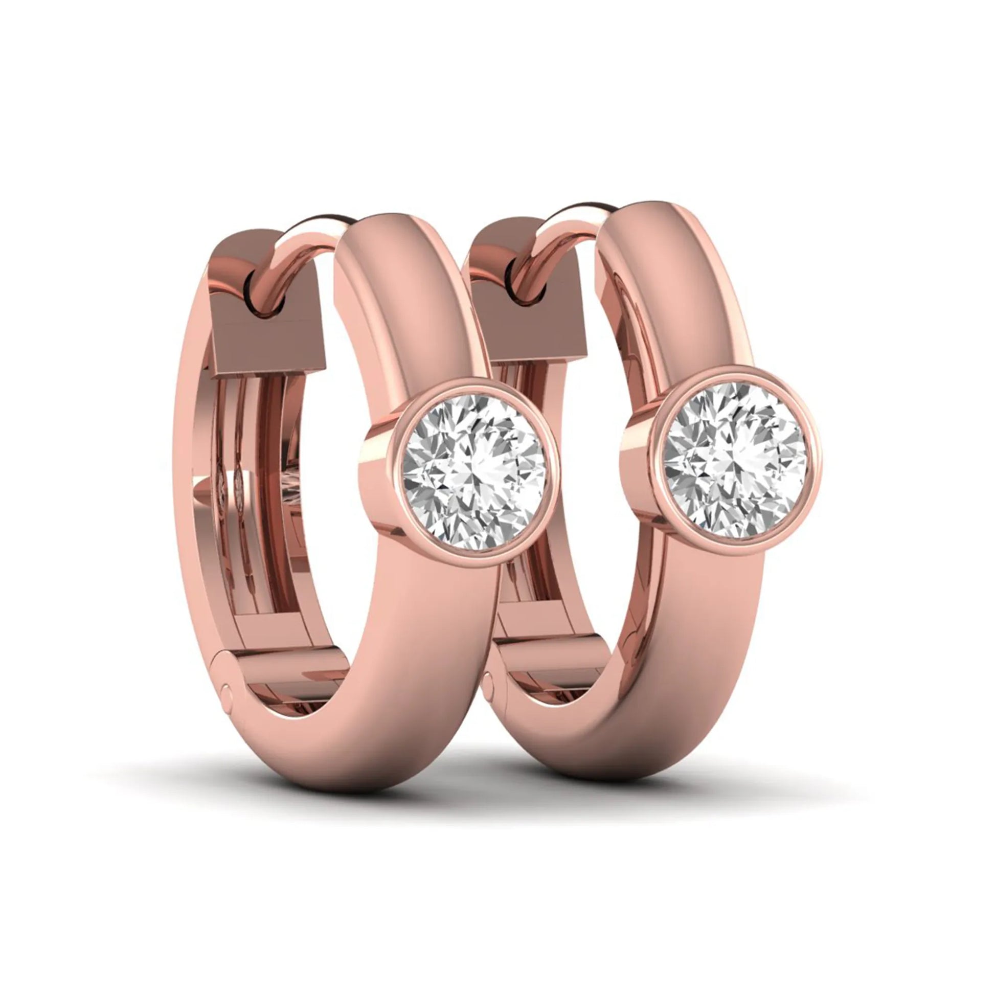 Bezel set round cut lab grown diamond huggie hoop earrings featuring a hinged snap closure and polished rose gold design.