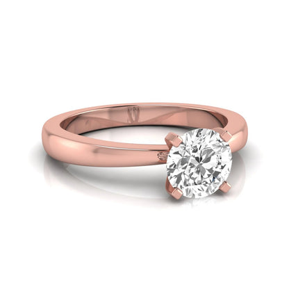 Classic round lab grown diamond solitaire engagement ring featuring a 0.68 carat IGI certified round cut diamond in a timeless four-prong rose gold setting.