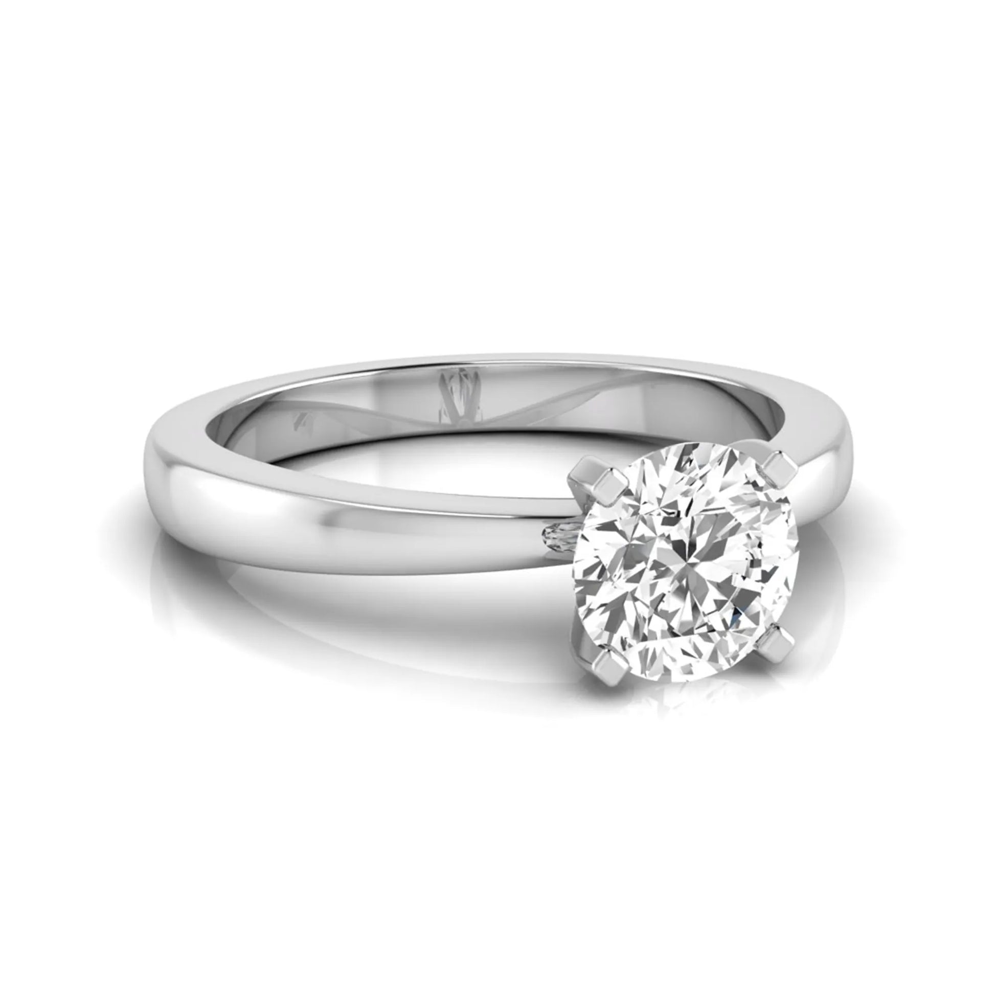 Classic round lab grown diamond solitaire engagement ring featuring a 0.68 carat IGI certified round cut diamond in a timeless four-prong white gold setting.