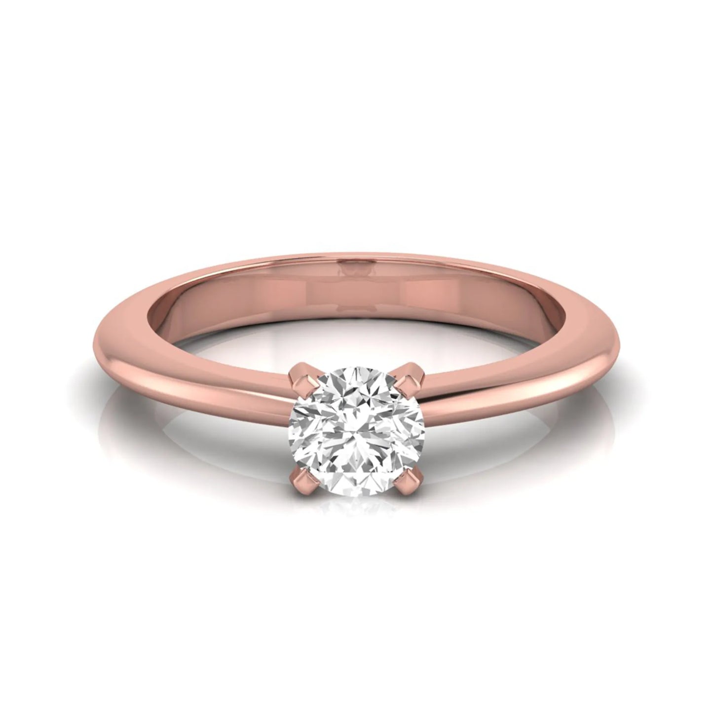 Classic round lab grown diamond solitaire engagement ring with a four-prong setting in rose gold.