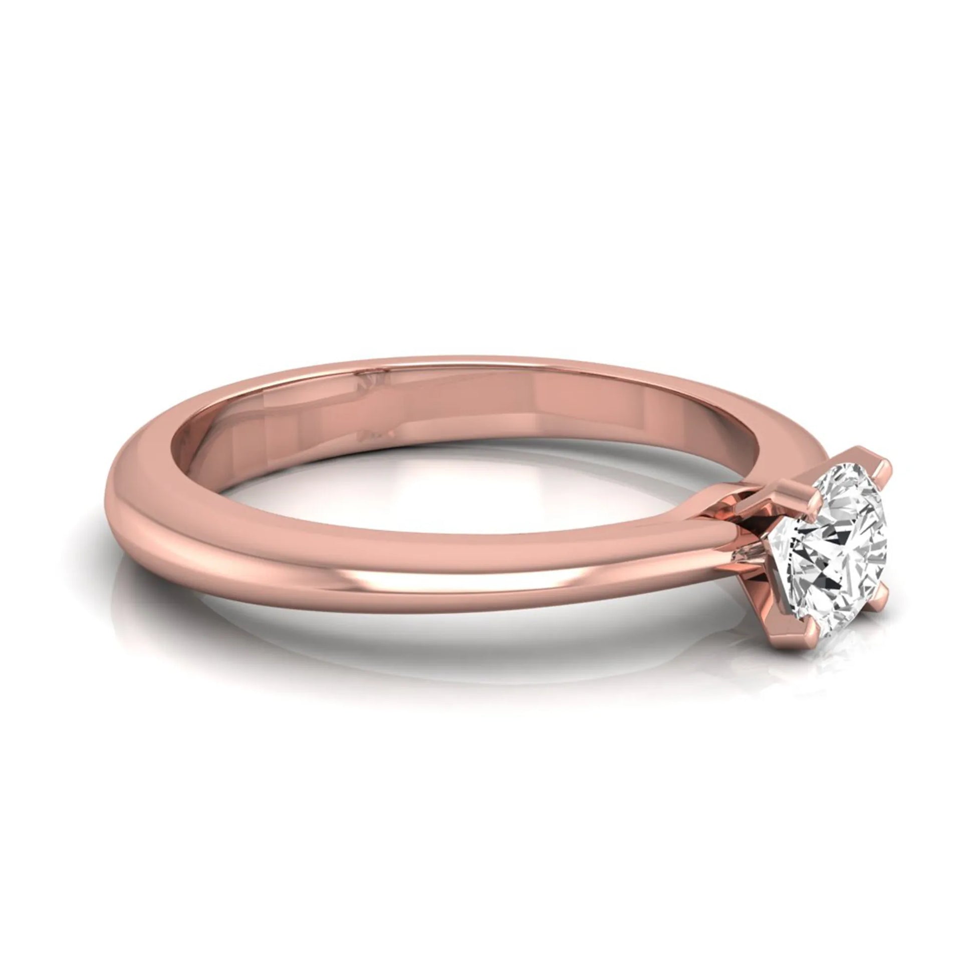 Classic round lab grown diamond solitaire engagement ring with a four-prong setting in rose gold.