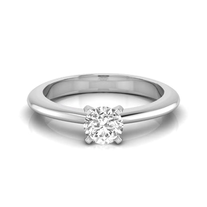 Classic round lab grown diamond solitaire engagement ring with a four-prong setting in white gold.