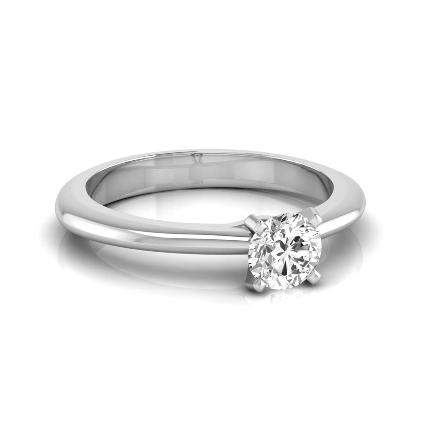 Classic round lab grown diamond solitaire engagement ring with a four-prong setting in white gold.