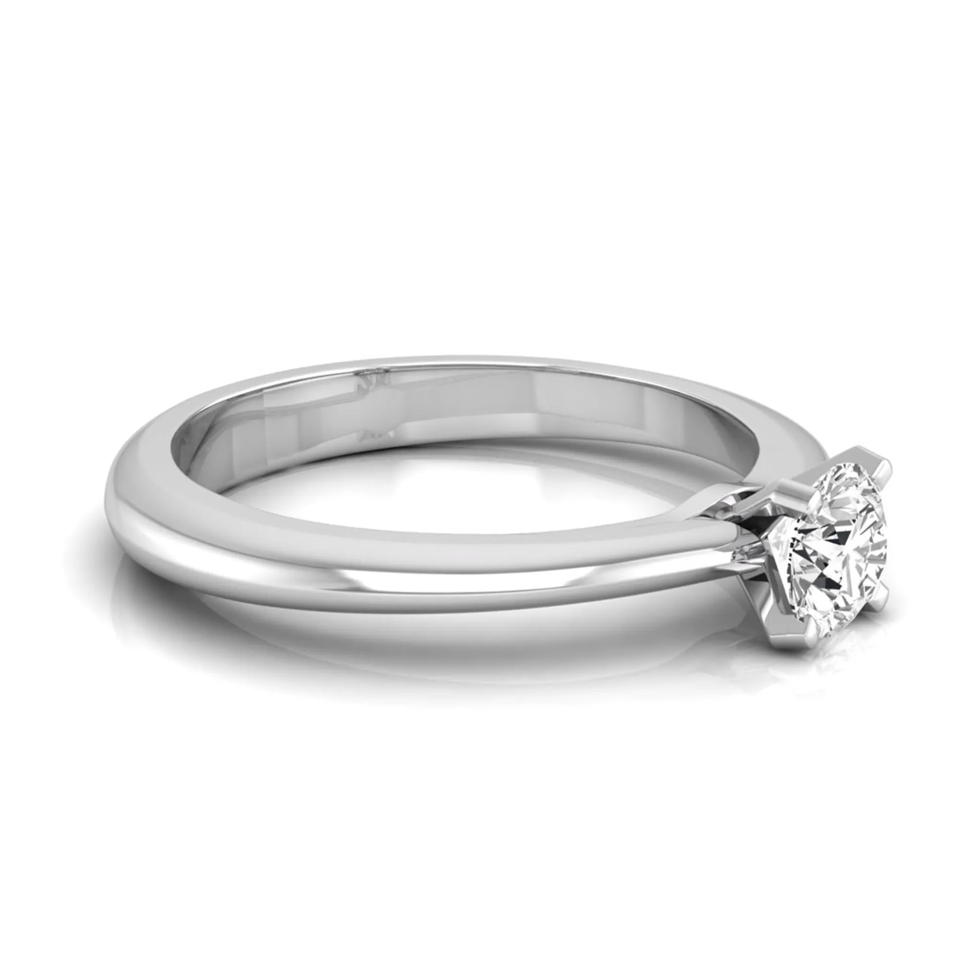 Classic round lab grown diamond solitaire engagement ring with a four-prong setting in white gold.