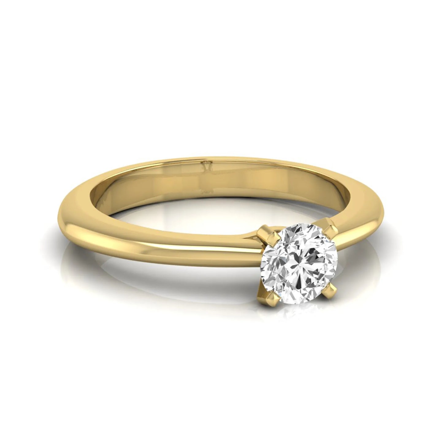 Classic round lab grown diamond solitaire engagement ring with a four-prong setting in yellow gold.