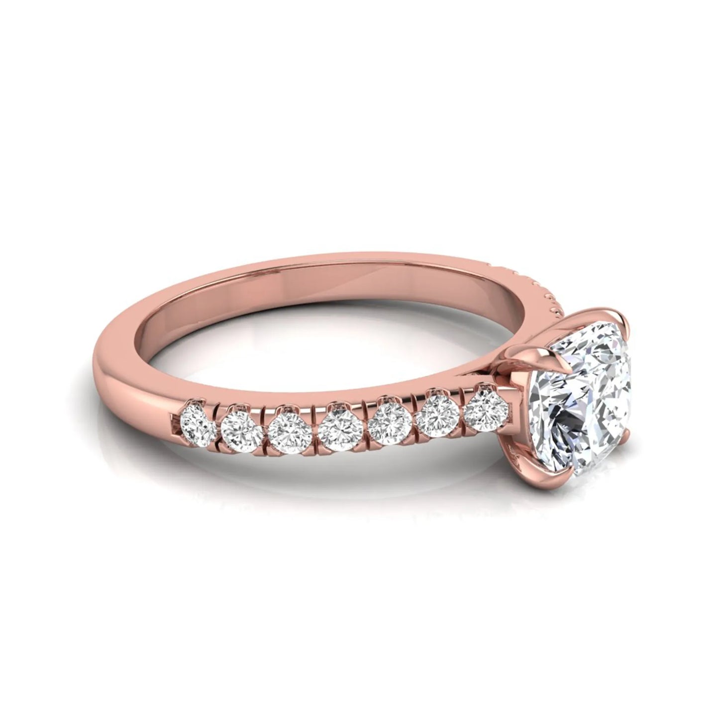 Cushion cut lab grown diamond engagement ring featuring a 1.03 carat center diamond in a four-prong setting with round accent diamonds on a rose gold design.
