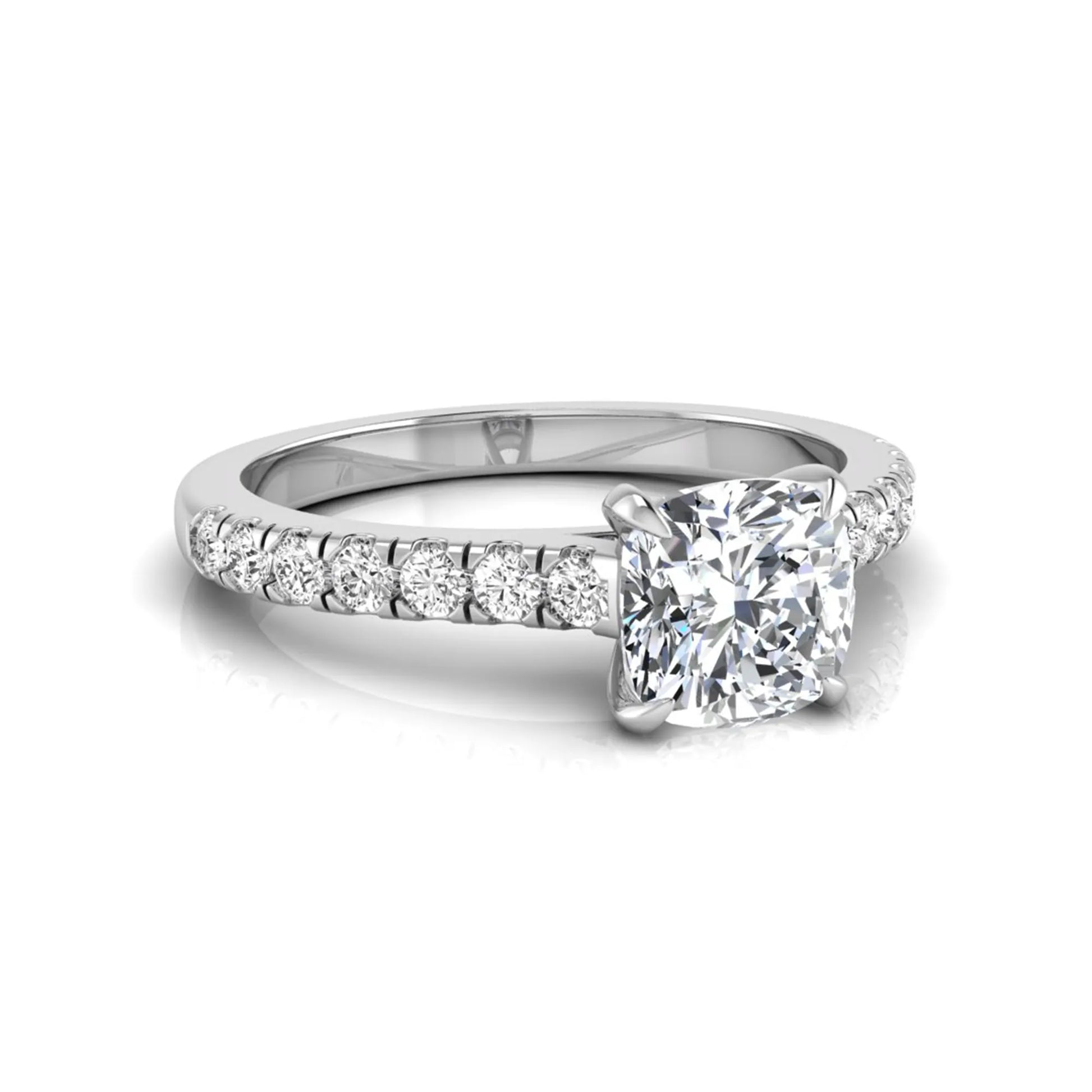 Cushion cut lab grown diamond engagement ring featuring a 1.03 carat center diamond in a four-prong setting with round accent diamonds on a white gold design.