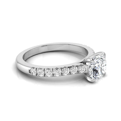 Cushion cut lab grown diamond engagement ring featuring a 1.03 carat center diamond in a four-prong setting with round accent diamonds on a white gold design.