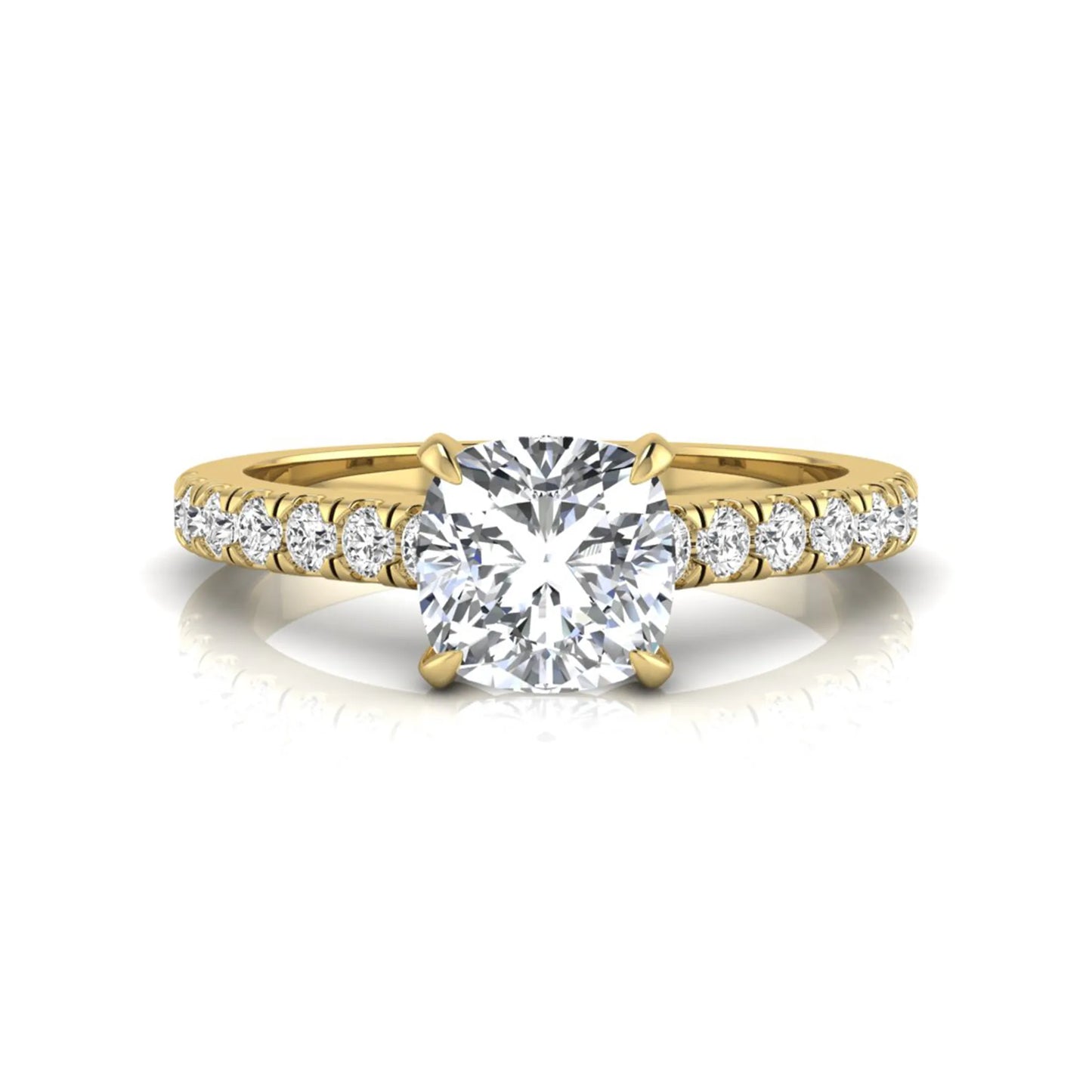 Cushion cut lab grown diamond engagement ring featuring a 1.03 carat center diamond in a four-prong setting with round accent diamonds on a yellow gold design.
