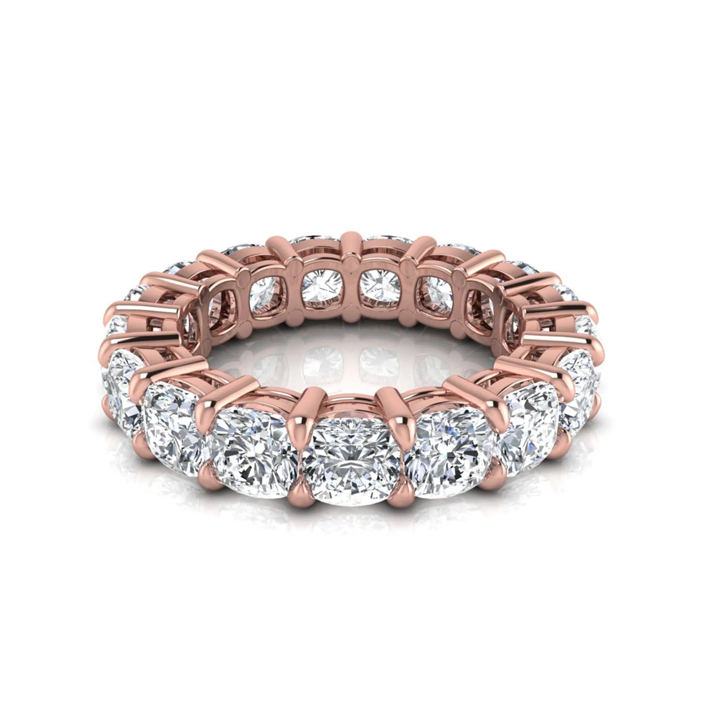 Cushion cut lab grown diamond eternity band ring featuring shared prong set diamonds with a rose gold tone design.