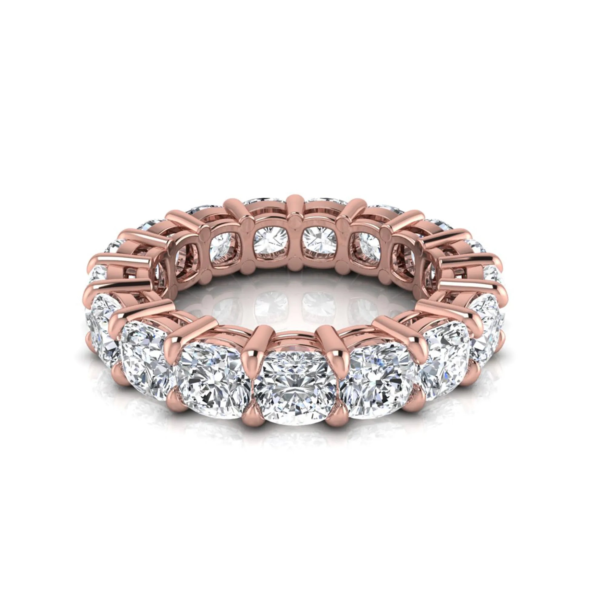 Cushion cut lab grown diamond eternity band ring featuring shared prong set diamonds with a rose gold tone design.
