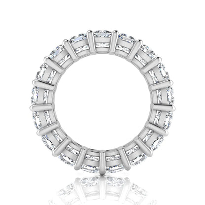 Cushion cut lab grown diamond eternity band ring featuring shared prong set diamonds with a white gold tone design.