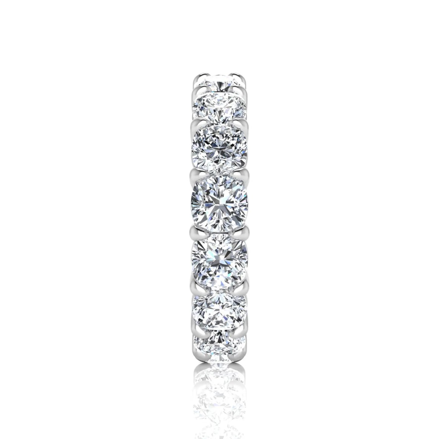 Cushion cut lab grown diamond eternity band ring featuring shared prong set diamonds with a white gold tone design.