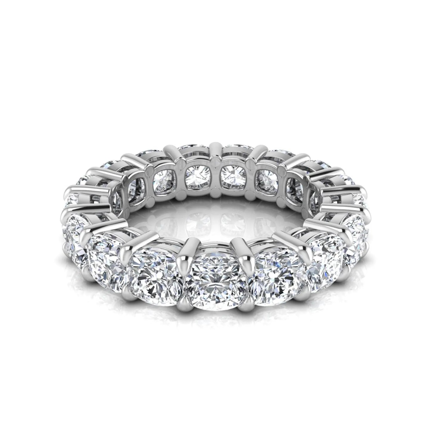 Cushion cut lab grown diamond eternity band ring featuring shared prong set diamonds with a white gold tone design.