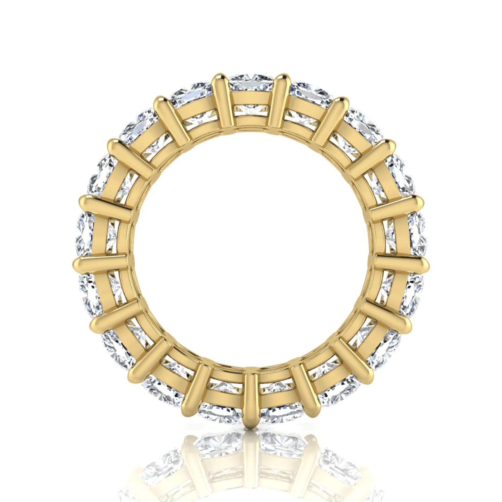 Cushion cut lab grown diamond eternity band ring featuring shared prong set diamonds with a yellow gold tone design.