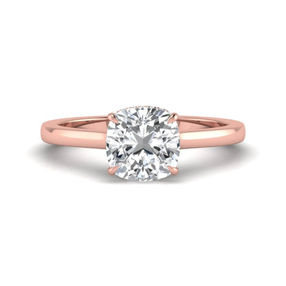IGI certified cushion cut lab grown diamond hidden halo solitaire engagement ring in rose gold.