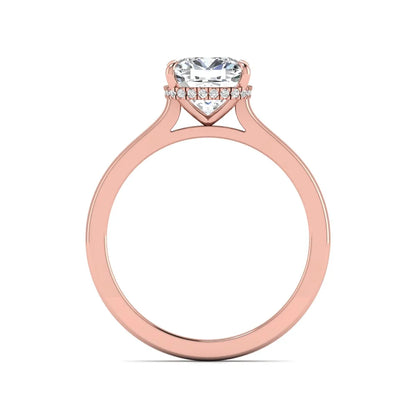 IGI certified cushion cut lab grown diamond hidden halo solitaire engagement ring in rose gold.