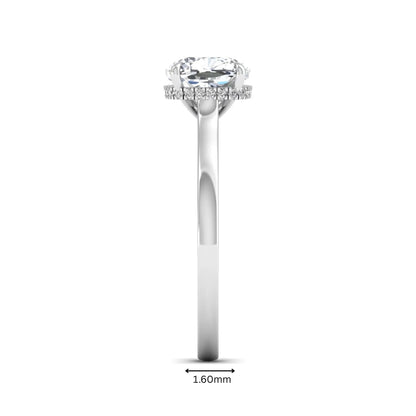 IGI certified cushion cut lab grown diamond hidden halo solitaire engagement ring in white gold.