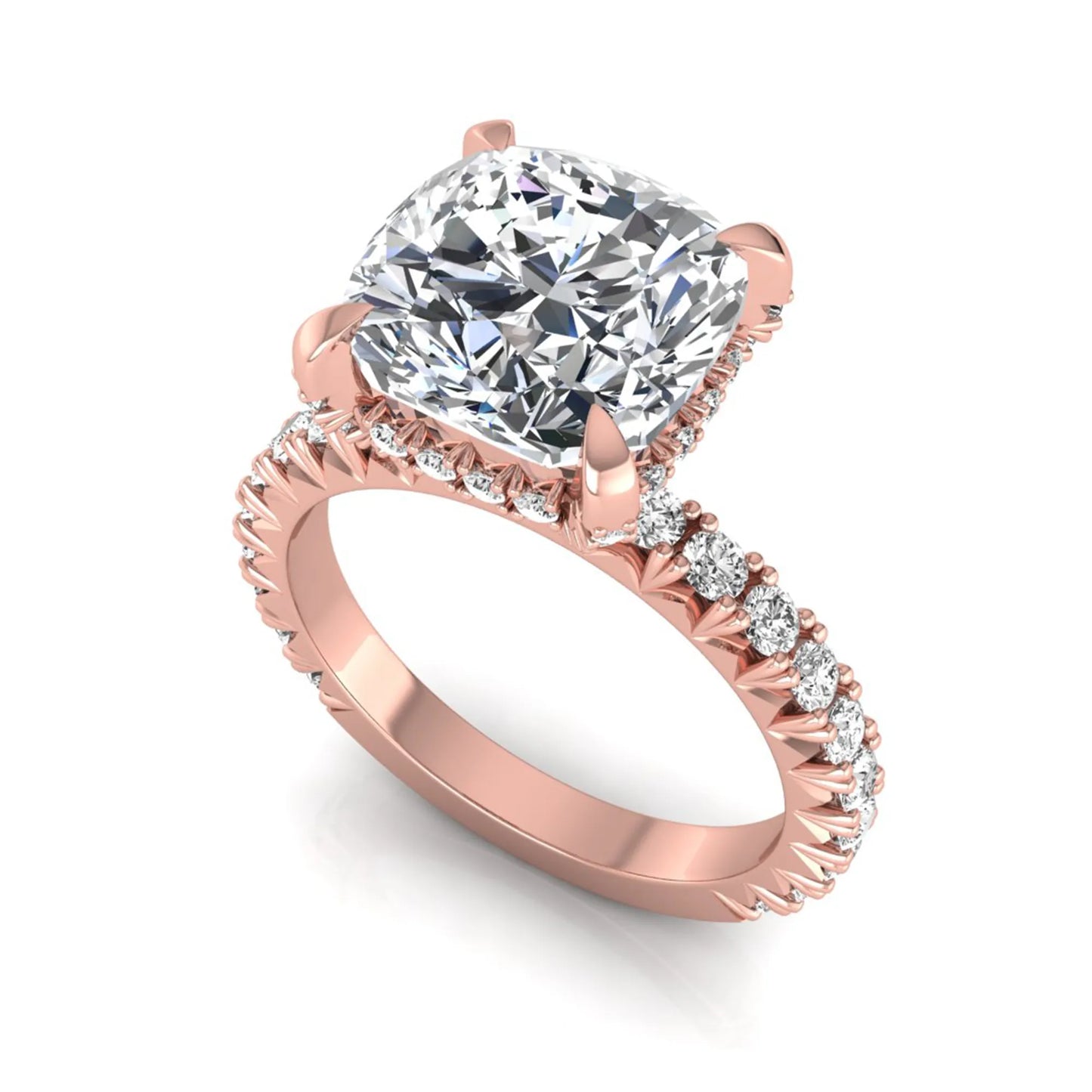 Cushion cut lab grown diamond engagement ring featuring a four-prong setting with round pavé side diamonds and rose gold tone band.