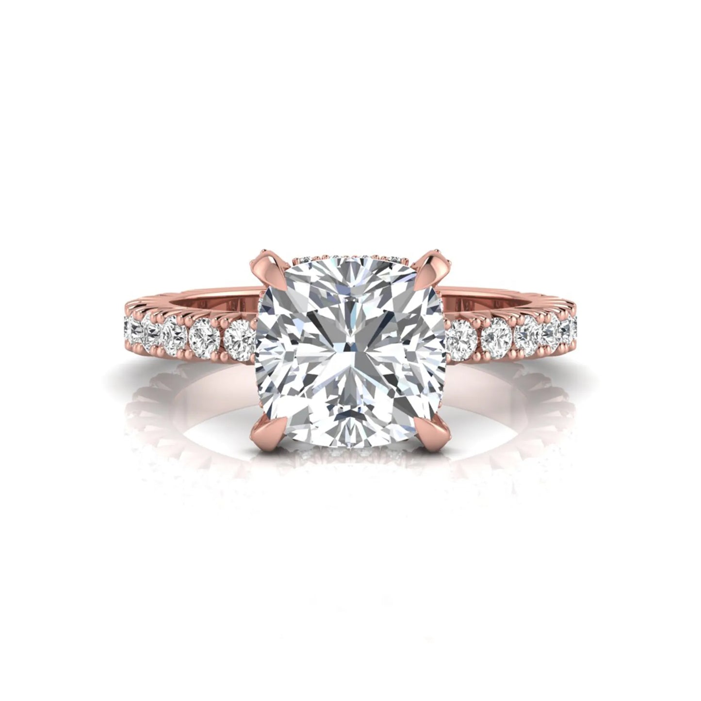 Cushion cut lab grown diamond engagement ring featuring a four-prong setting with round pavé side diamonds and rose gold tone band.