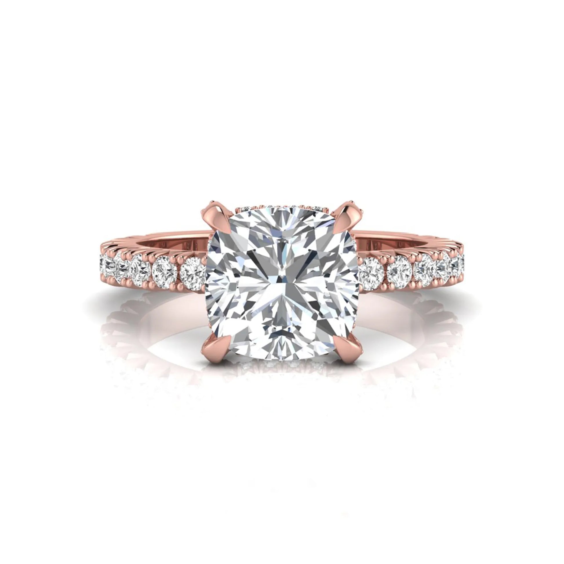 Cushion cut lab grown diamond engagement ring featuring a four-prong setting with round pavé side diamonds and rose gold tone band.