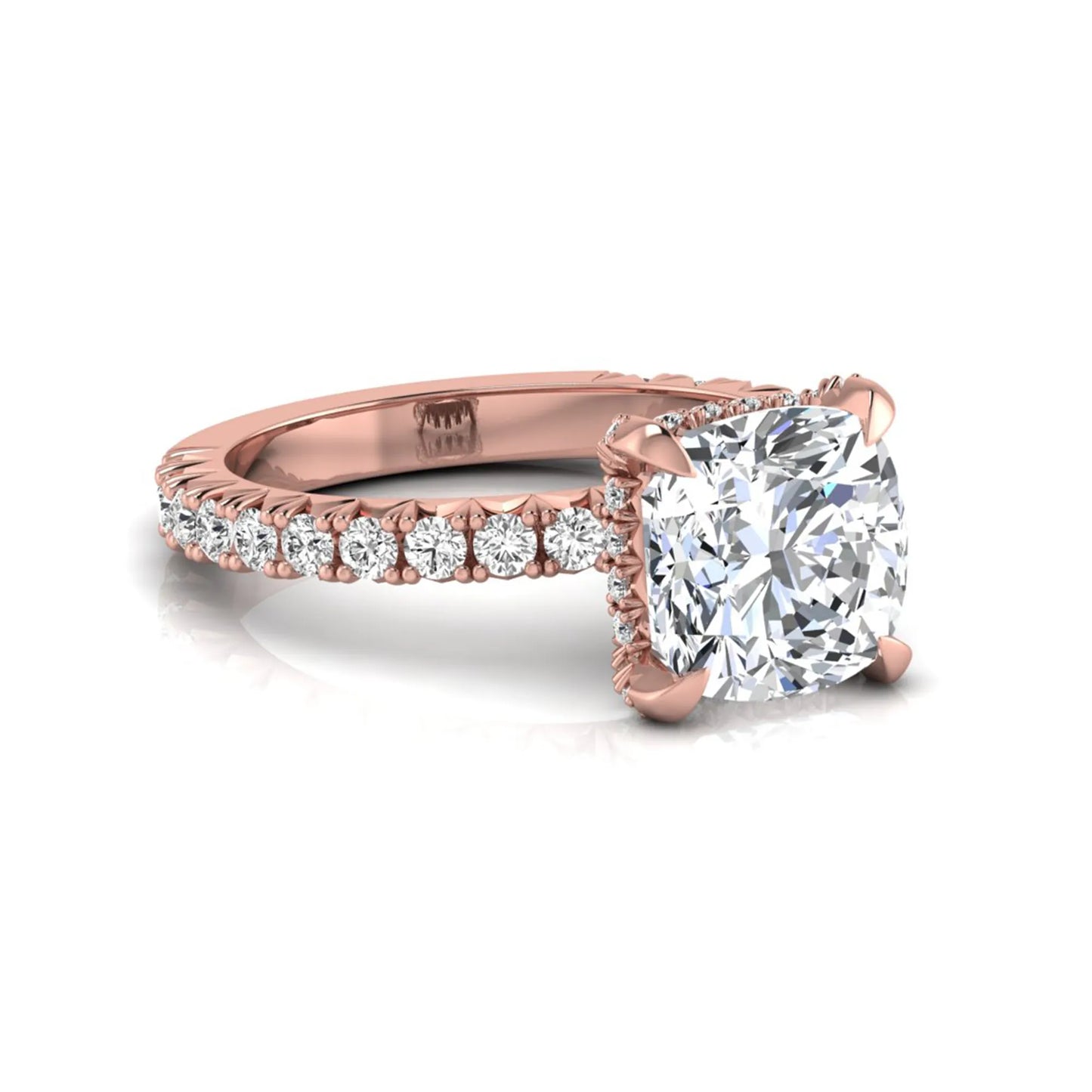 Cushion cut lab grown diamond engagement ring featuring a four-prong setting with round pavé side diamonds and rose gold tone band.