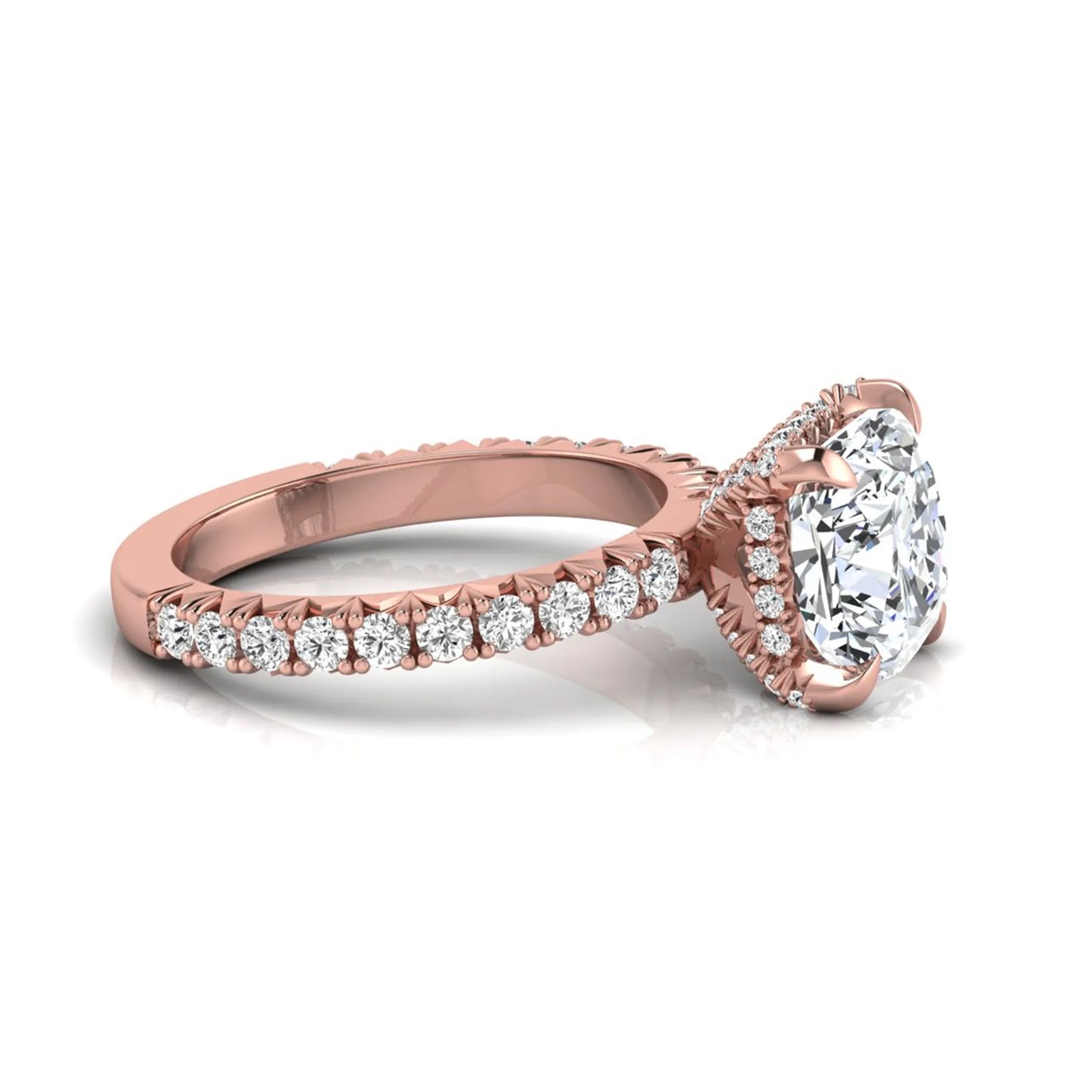 Cushion cut lab grown diamond engagement ring featuring a four-prong setting with round pavé side diamonds and rose gold tone band.