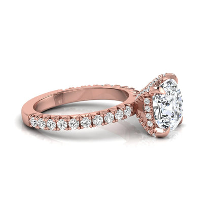 Cushion cut lab grown diamond engagement ring featuring a four-prong setting with round pavé side diamonds and rose gold tone band.