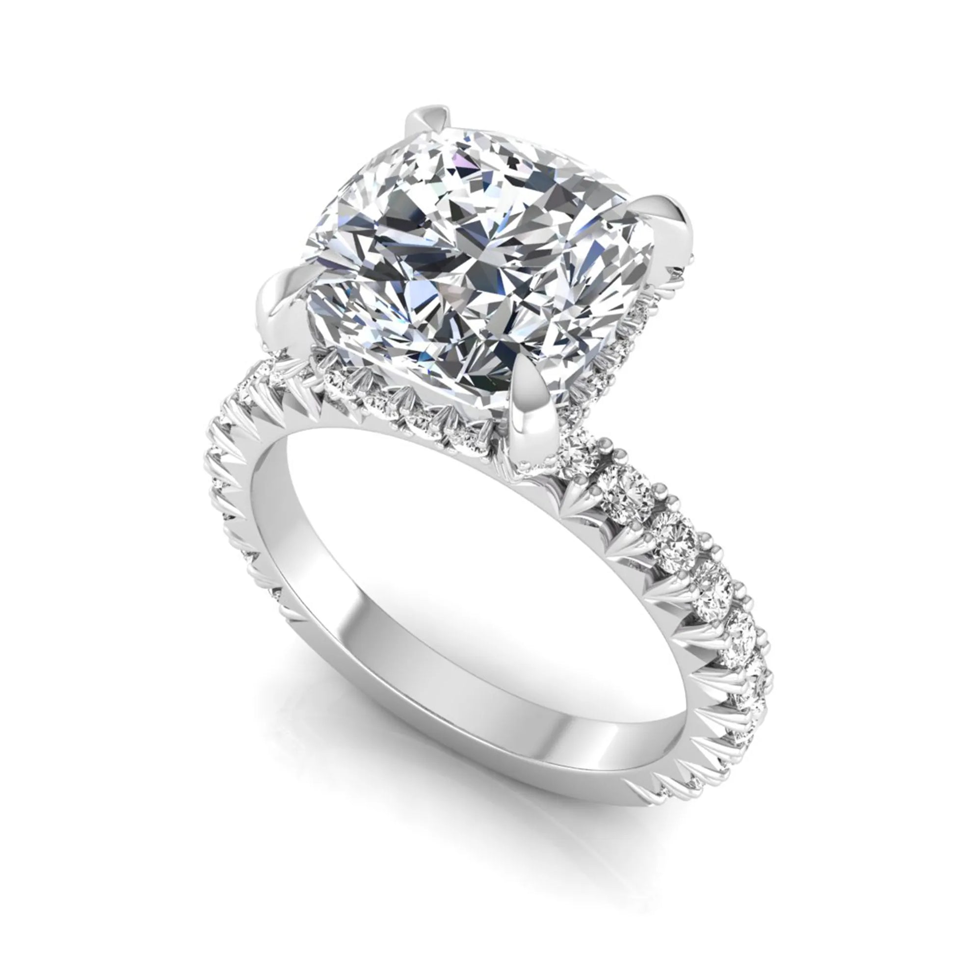 Cushion cut lab grown diamond engagement ring featuring a four-prong setting with round pavé side diamonds and white gold tone band.