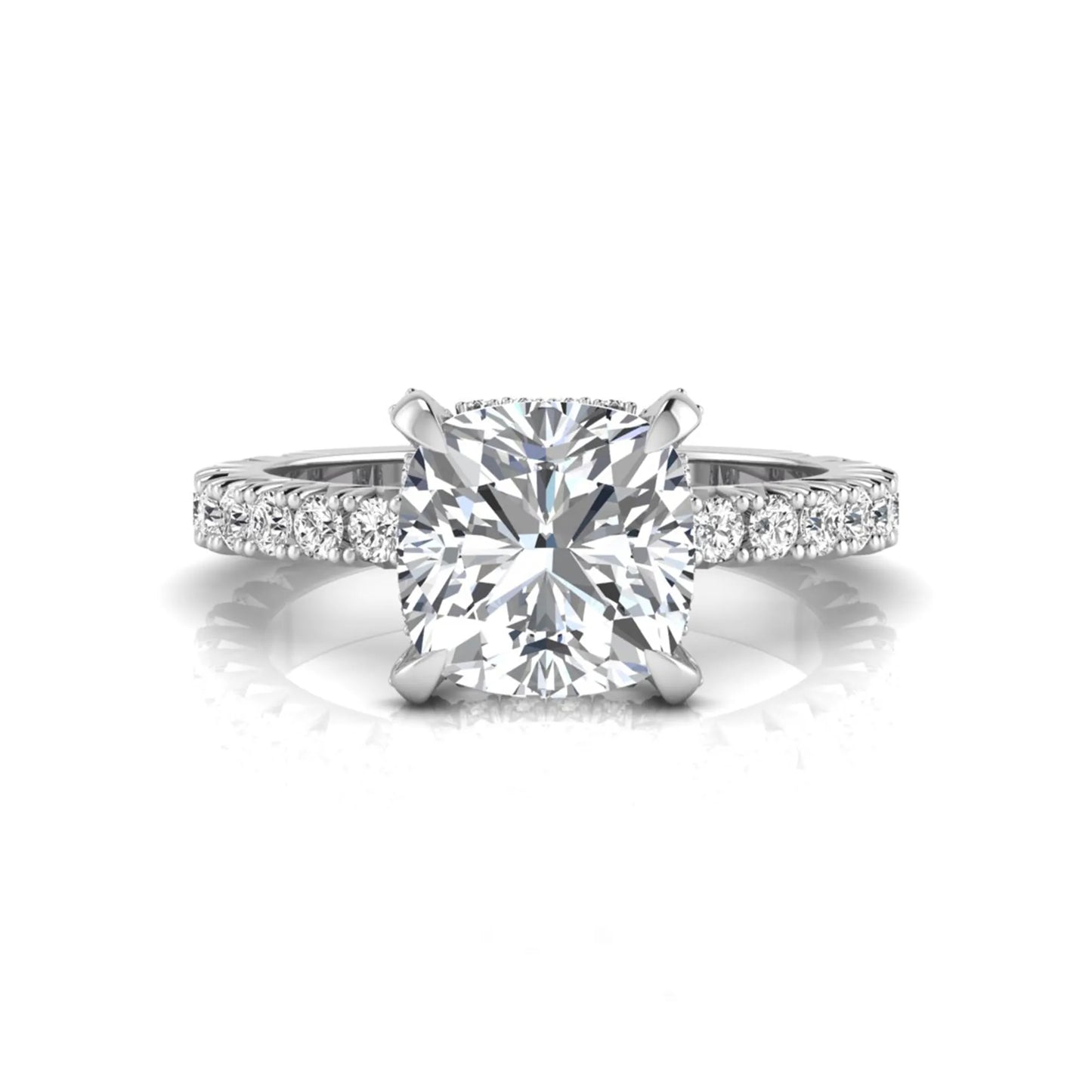 Cushion cut lab grown diamond engagement ring featuring a four-prong setting with round pavé side diamonds and white gold tone band.