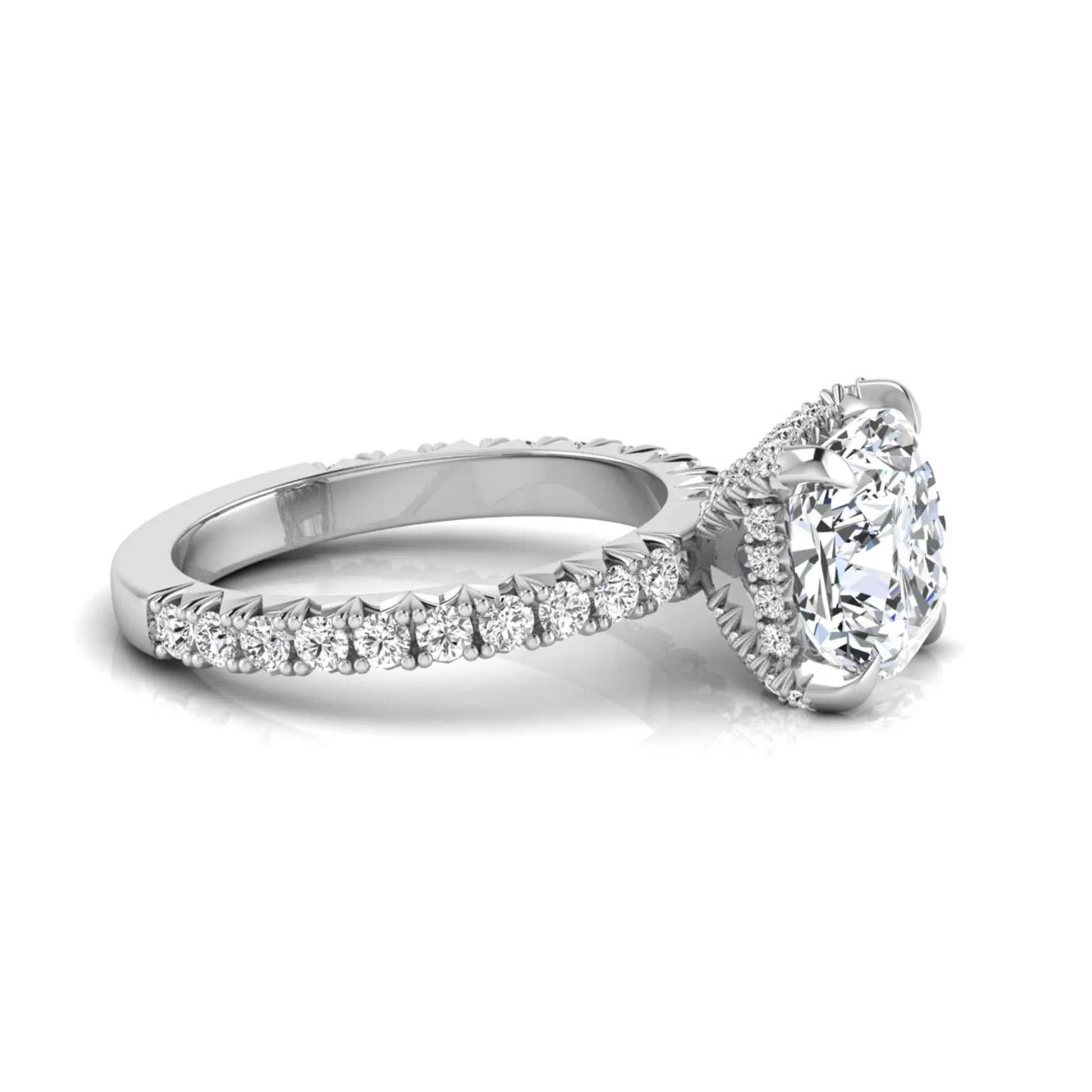 Cushion cut lab grown diamond engagement ring featuring a four-prong setting with round pavé side diamonds and white gold tone band.